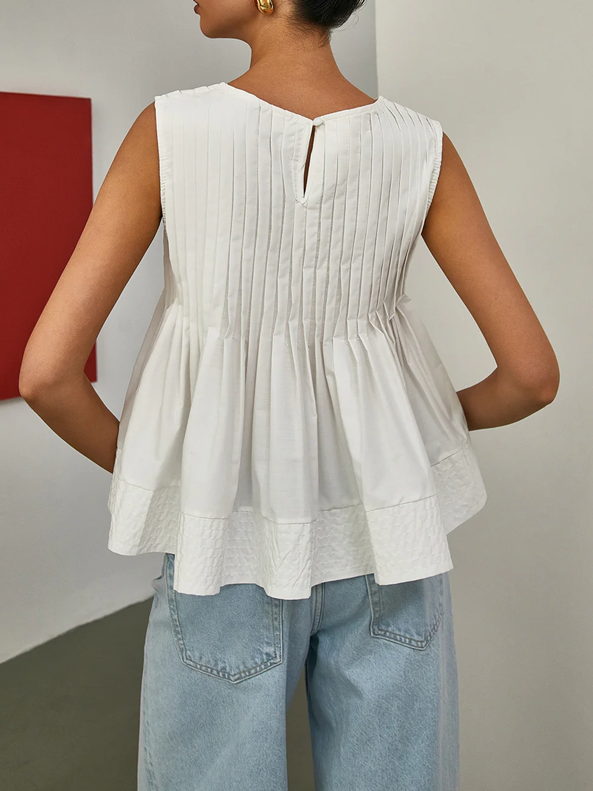 Pleated Peplum Sleeveless Blouse